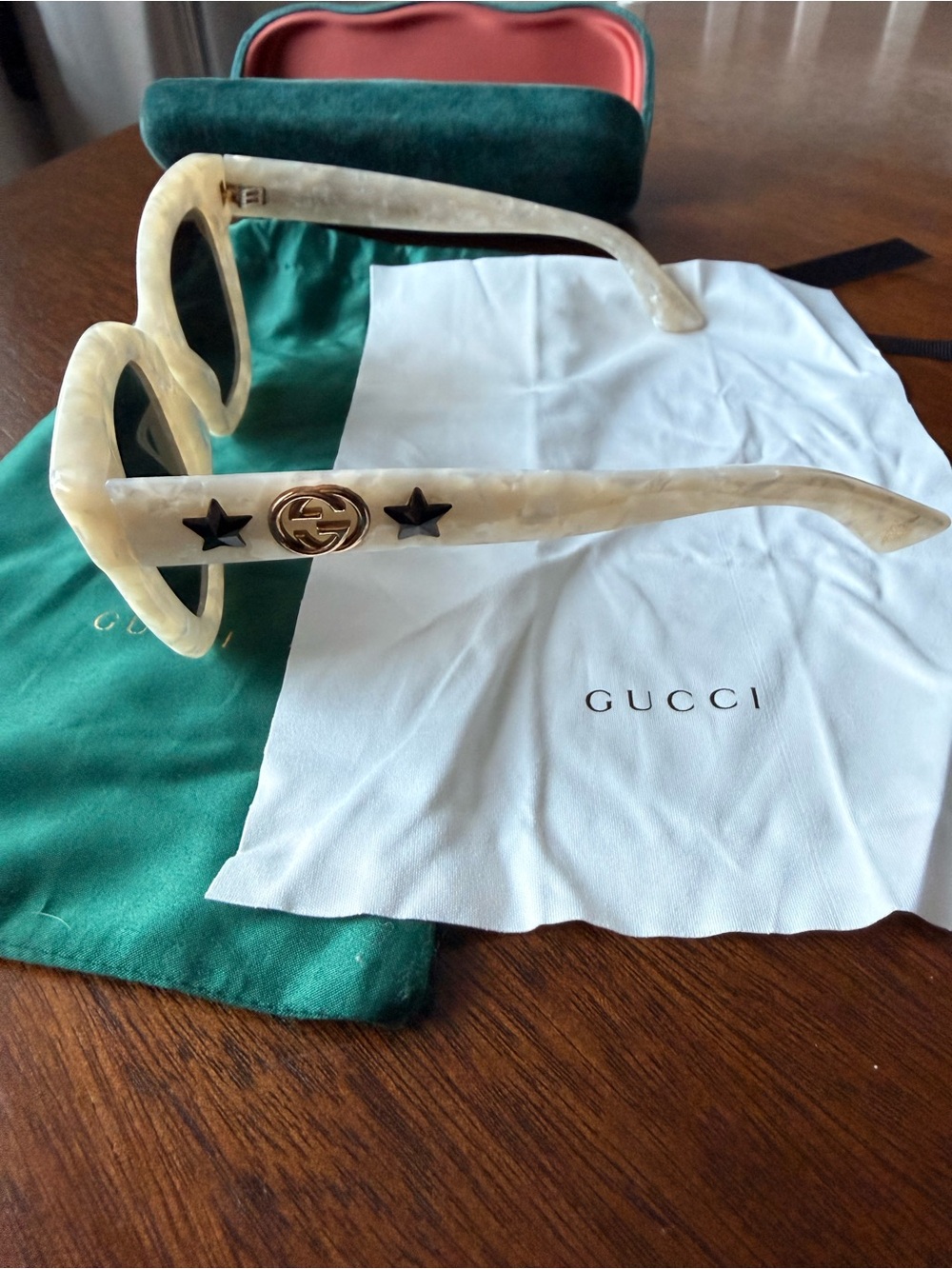 Gucci Ivory Marbled Oversized Sunglasses with Gold Logo and Black Star Accents